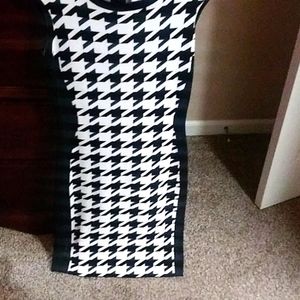 Black and white checked dress.